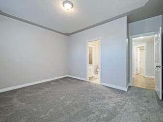 Photo 21: 302 Garrison Square SW in Calgary: Garrison Woods Row/Townhouse for sale : MLS®# C4225939