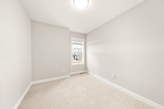 Photo 21: 20 Heritage Rise: Cochrane Row/Townhouse for sale : MLS®# A1214590