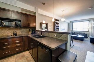 Photo 6: 330 26 Val Gardena View SW in Calgary: Springbank Hill Apartment for sale : MLS®# A2128440