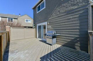Photo 4: 1301 829 Coach Bluff Crescent in Calgary: Coach Hill Row/Townhouse for sale : MLS®# A1094909
