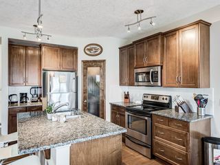 Photo 5: 332c Silvergrove Place NW in Calgary: Silver Springs Detached for sale : MLS®# A1139614
