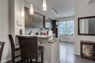Photo 8: 311 Ascot Circle SW in Calgary: Aspen Woods Row/Townhouse for sale : MLS®# A2123696