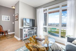 Photo 2: 3 117 Rockyledge View NW in Calgary: Rocky Ridge Row/Townhouse for sale : MLS®# A2007513