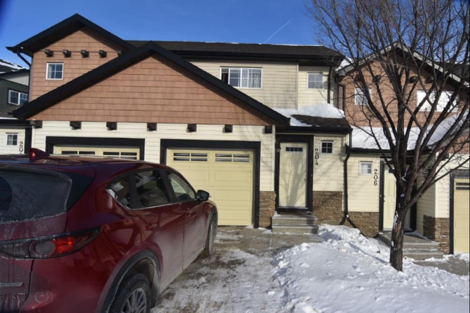 Main Photo: 204 Pantego Lane NW in Calgary: Panorama Hills Row/Townhouse for sale : MLS®# A1171270