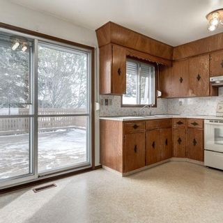 Photo 9: 944 Hunterston Hill NW in Calgary: Huntington Hills Detached for sale : MLS®# A2031918