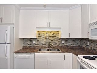 Photo 10: 301 2780 WARE Street in Abbotsford: Central Abbotsford Condo for sale in "Chelsea House" : MLS®# R2110446