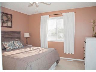 Photo 18: 17 CRYSTAL SHORES Heights: Okotoks House for sale : MLS®# C4017204