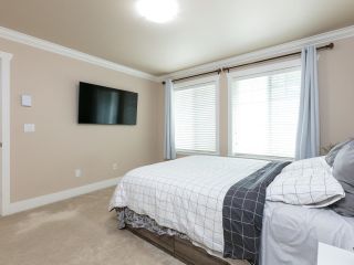Photo 17: 101 15399 GUILDFORD Drive in Surrey: Guildford Townhouse for sale (North Surrey)  : MLS®# R2724875