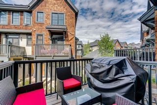 Photo 32: 235 ASCOT Circle SW in Calgary: Aspen Woods Row/Townhouse for sale : MLS®# A1025064