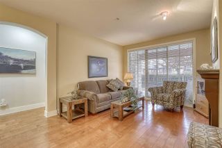 Photo 2: 107 16421 64 Avenue in Surrey: Cloverdale BC Condo for sale in "St. Andrews" (Cloverdale)  : MLS®# R2458467