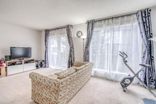Photo 2: 221 Bridlewood Lane SW in Calgary: Bridlewood Row/Townhouse for sale : MLS®# A1175689