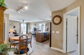 Photo 11: 1204 92 Crystal Shores Road: Okotoks Apartment for sale : MLS®# A1083634