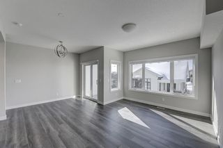 Photo 8: 908 Crestridge Common SW in Calgary: Crestmont Row/Townhouse for sale : MLS®# A2030391