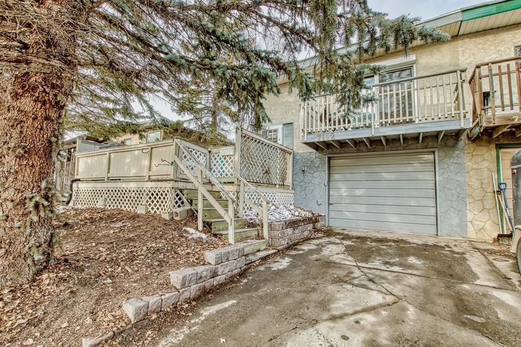 Main Photo: 7112 54 Avenue NW in Calgary: Silver Springs Semi Detached (Half Duplex) for sale : MLS®# A2019304