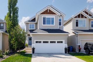 Photo 1: 69 Cougartown Circle SW in Calgary: Cougar Ridge Detached for sale : MLS®# A2122630