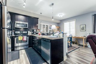 Photo 5: 3107 15 Sunset Square: Cochrane Apartment for sale : MLS®# A1246617