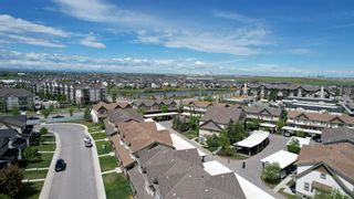 Photo 2: 85 Copperpond Heights SE in Calgary: Copperfield Row/Townhouse for sale : MLS®# A1228172