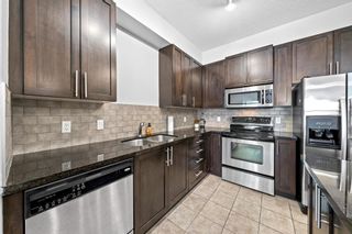 Photo 8: 311 88 Arbour Lake Road NW in Calgary: Arbour Lake Apartment for sale : MLS®# A1231436
