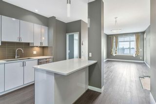Photo 2: 405 28 Auburn Bay Link SE in Calgary: Auburn Bay Apartment for sale : MLS®# A1231846