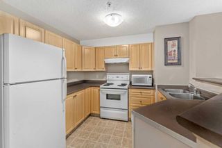 Photo 4: 1215 16320 24 Street SW in Calgary: Bridlewood Apartment for sale : MLS®# A2125069