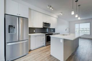 Photo 8: 132 Evanscrest Manor NW in Calgary: Evanston Row/Townhouse for sale : MLS®# A2047618
