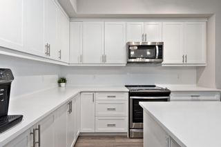 Photo 3: 408 100 Auburn Meadows Manor SE in Calgary: Auburn Bay Apartment for sale : MLS®# A2107067