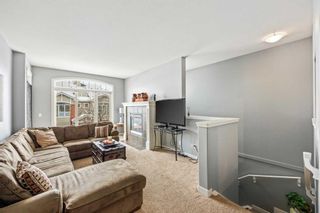 Photo 7: 404 8000 Wentworth Drive SW in Calgary: West Springs Row/Townhouse for sale : MLS®# A2128381