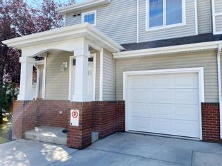 Photo 4: 1402 8000 Wentworth Drive SW in Calgary: West Springs Row/Townhouse for sale : MLS®# A1257578