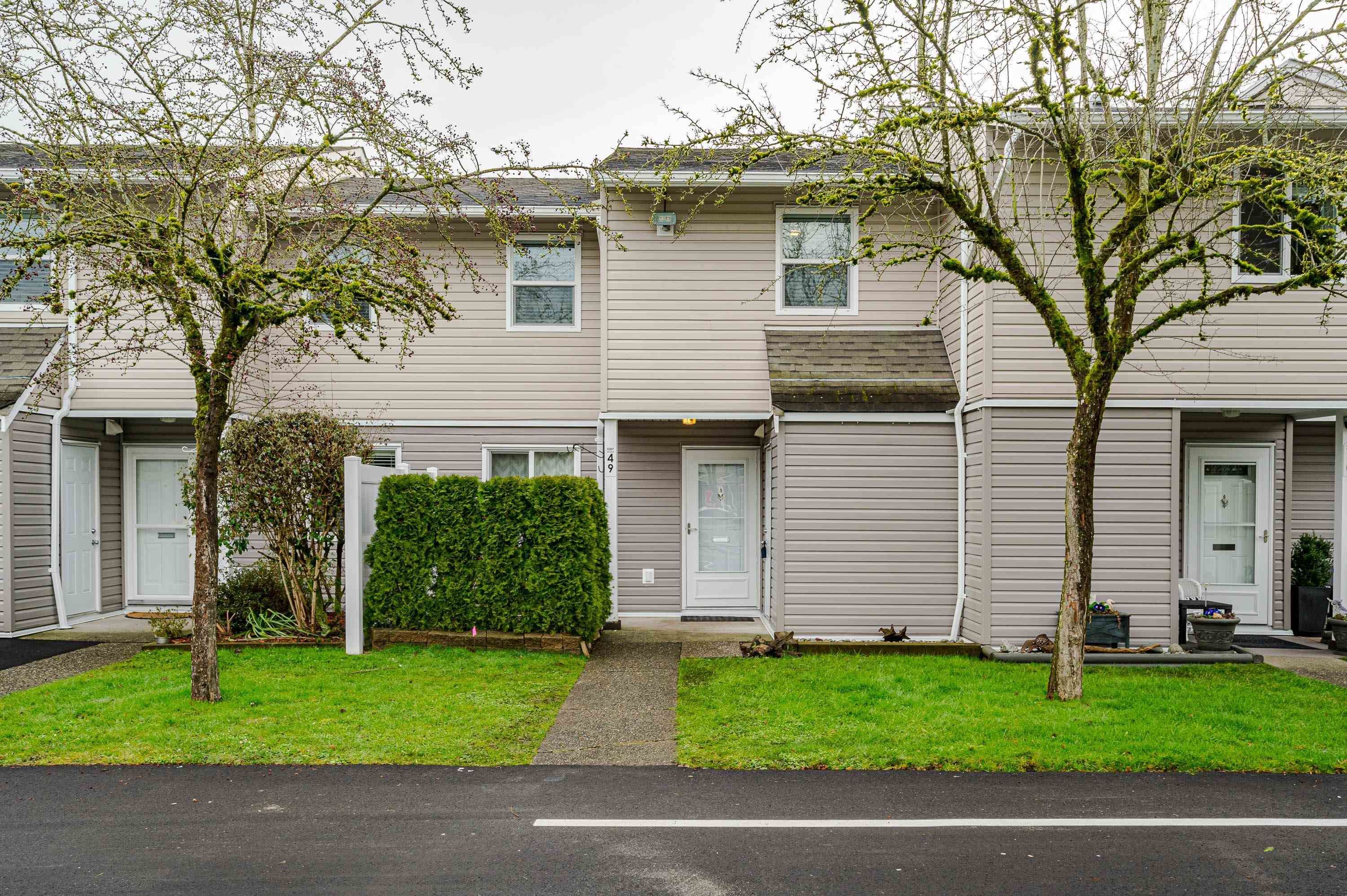 Main Photo: 49 5307 204 Street in Langley: Langley City Townhouse for sale in "MCMILLAN PLACE" : MLS®# R2642246