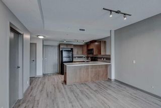 Photo 4: 609 210 15 Avenue SE in Calgary: Beltline Apartment for sale : MLS®# A2133315