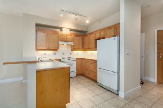 Photo 3: 211 6198 ASH Street in Vancouver: Oakridge VW Condo for sale in "THE GROVE" (Vancouver West)  : MLS®# R2193582