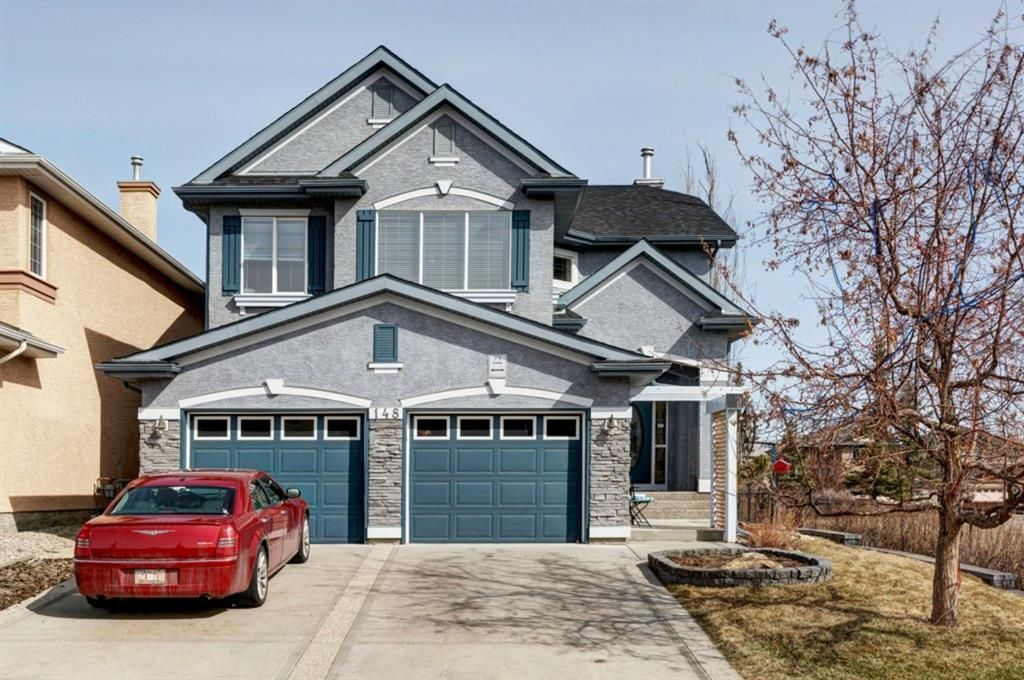 Main Photo: 148 Everwillow Green SW in Calgary: Evergreen Detached for sale : MLS®# A1207187