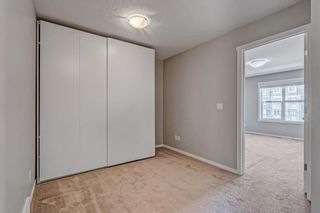 Photo 16: 94 Legacy Boulevard SE in Calgary: Legacy Row/Townhouse for sale : MLS®# A2034176