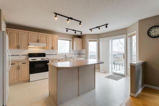 Photo 6: 384 Hidden Ranch Circle NW in Calgary: Hidden Valley Detached for sale : MLS®# A1209302