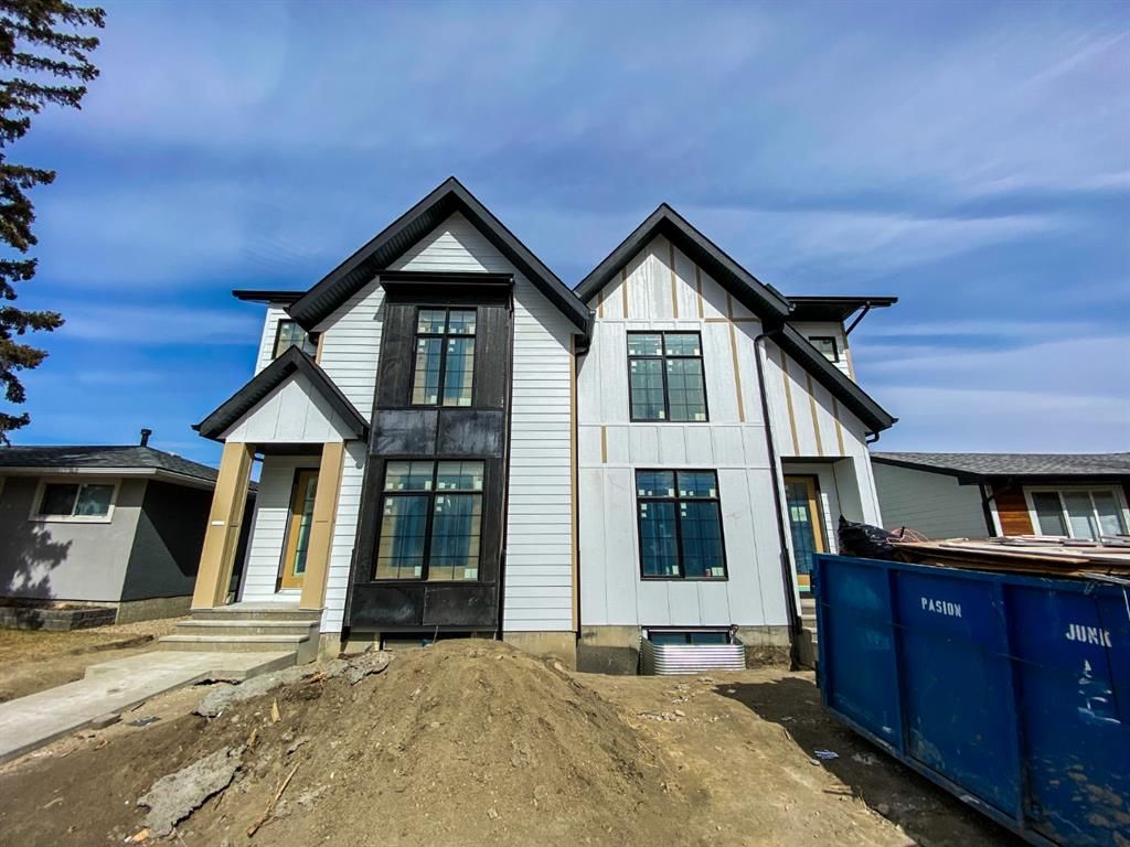 Main Photo: 2136 54 Avenue SW in Calgary: North Glenmore Park Semi Detached for sale : MLS®# A1154127