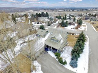 Photo 5: 219 Slopeview Drive SW in Calgary: Springbank Hill Detached for sale : MLS®# A1187658