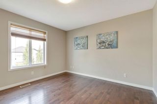 Photo 11: 349 Bridleridge View SW in Calgary: Bridlewood Detached for sale : MLS®# A1129247