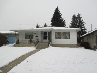 Photo 1: 5819 21 Street SW in Calgary: North Glenmore Residential Detached Single Family for sale : MLS®# C3652293