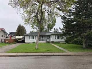 Photo 1: 2034 52 Avenue SW in Calgary: North Glenmore Park Detached for sale : MLS®# A2137212