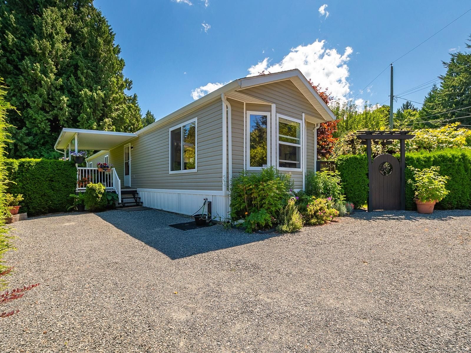 Main Photo: 1 6990 Dickinson Rd in Lantzville: Na Lower Lantzville Manufactured Home for sale (Nanaimo)  : MLS®# 882618