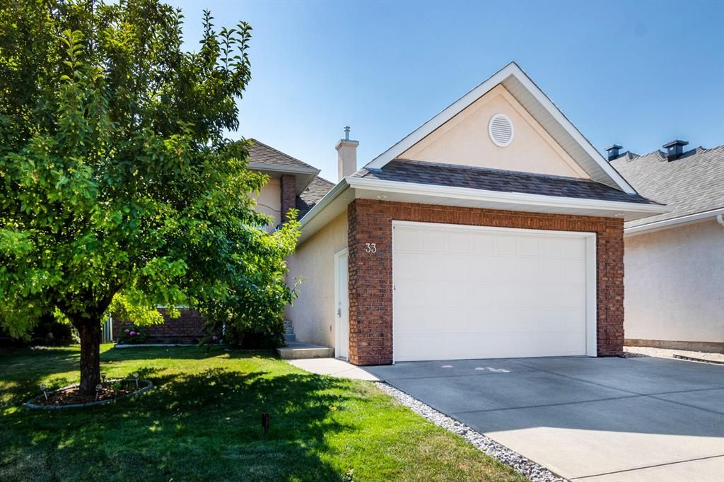 Main Photo: 33 Strathridge Crescent SW in Calgary: Strathcona Park Detached for sale : MLS®# A1252470
