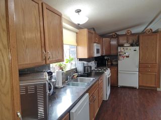 Photo 8: 402 37543 England Way: Rural Red Deer County Mobile for sale : MLS®# A1254874