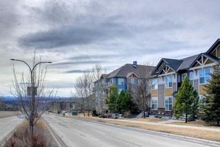 Photo 1: 705 101 Sunset Drive: Cochrane Row/Townhouse for sale : MLS®# A2106577