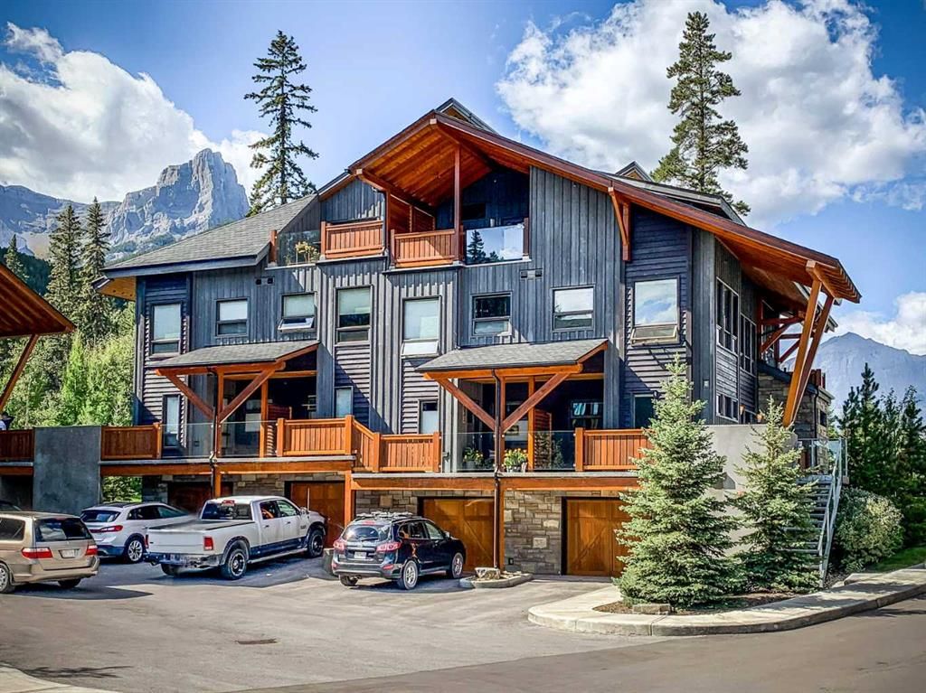 Main Photo: 604 3000J Stewart Creek Drive: Canmore Row/Townhouse for sale : MLS®# A2102531