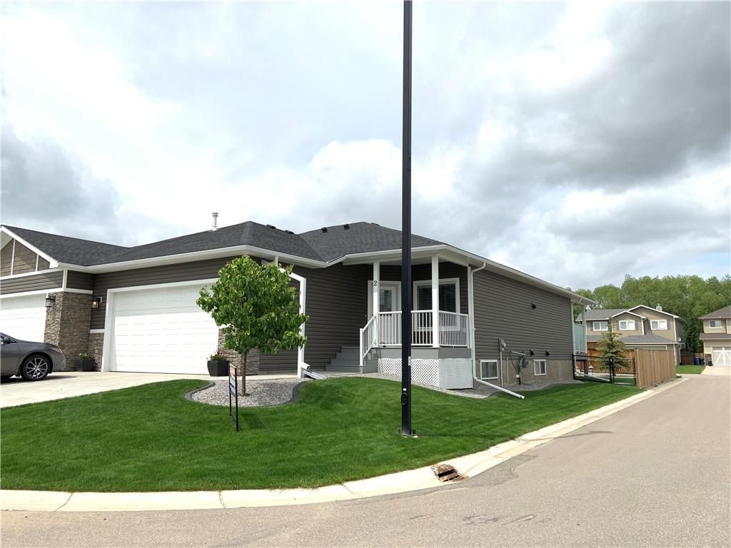 Main Photo: 2 Stone Garden Crescent: Carstairs Semi Detached for sale : MLS®# C4293584