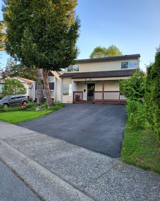 Photo 1: 7135 129A Street in Surrey: West Newton House for sale : MLS®# R2775419
