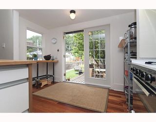 Photo 5: 2255 E 8TH Avenue in Vancouver: Grandview VE House for sale in "COMMERCIAL DRIVE" (Vancouver East)  : MLS®# V780371