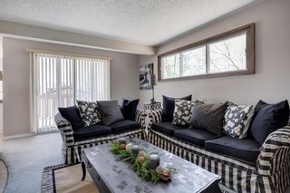 Photo 10: 7 Coach Manor Rise SW in Calgary: Coach Hill Detached for sale : MLS®# A2049271