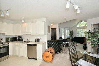 Photo 4: 417 10 Sierra Morena Mews SW in Calgary: Signal Hill Condo for sale : MLS®# C4133490