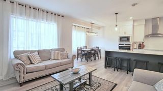 Photo 8: 135 Belmont Crescent SW in Calgary: Belmont Detached for sale : MLS®# A2127362